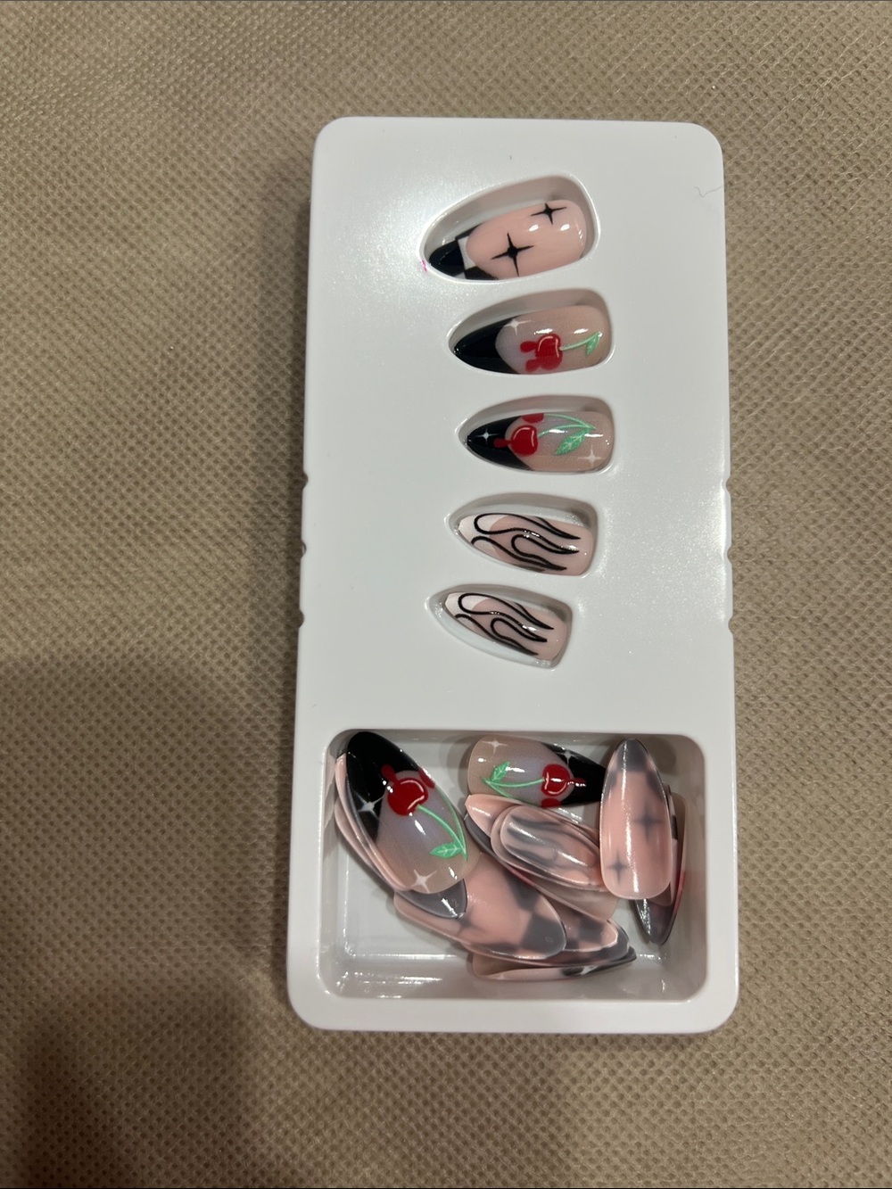 Glossy Peach Press On Nails with Cherry & Black Accents